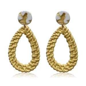 Bohemian bright yellow teardrop woven earrings with marble style round studs