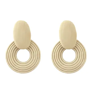 Minimalist geometric spiral wooden drop earrings in cream beige retro style