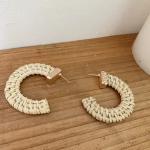 Bohemian C-shaped rattan woven earrings with vintage hammered gold metal studs