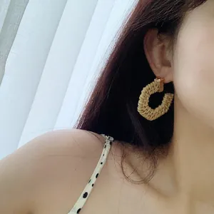Handmade bohemian geometric rattan woven C-shaped earrings with gold metal clasp