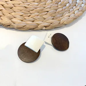Minimalist geometric wood and resin drop earrings with round brown wood and white square