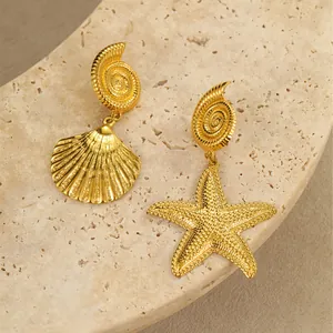 Gold stainless steel starfish and scallop shell asymmetric drop earrings on stone