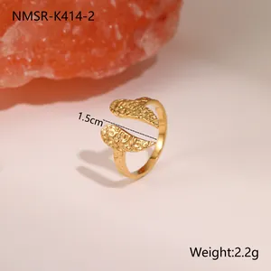 Adjustable gold hammered titanium steel ring with unique geometric leaf-shaped design