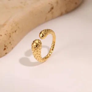 Minimalist gold two-tone hammered texture open cuff bracelet with wavy metallic finish