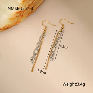 Détail de boucles d'oreilles pompons bicolores en or 18K et argent avec dimensions exactes