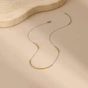 Minimalist gold and silver two-tone chain necklace in stainless steel with lobster clasp