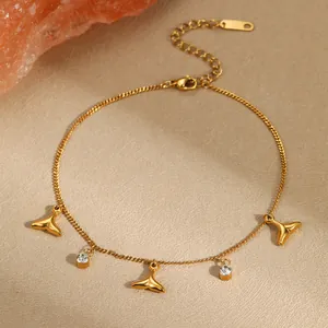 Bracelet océan doré avec pendentifs queue de poisson et zircons brillants et fermoir