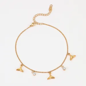 Bracelet élégant en acier inoxydable doré avec pendentifs queue de poisson et zircons