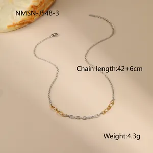 Detailed shot of two-tone chain necklace with twisted texture links and 42+6cm length