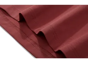 Detail shot of heavy cotton T-shirt hem with professional double-needle stitching