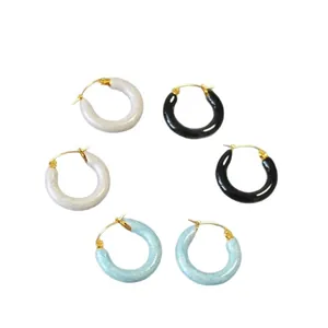 Three pairs of vintage colorful pearlescent enamel hoop earrings in white black and blue