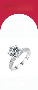 Close-up of S925 silver lab diamond ring with six-prong setting and side accent stones