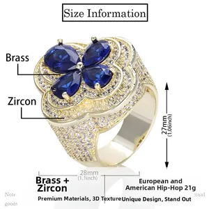 Macro detail of men's hip hop flower ring with blue pear-cut zircon stones and micro-pave