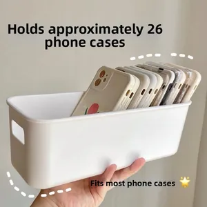 White rectangular storage box holding 26 phone cases with side cutout handles