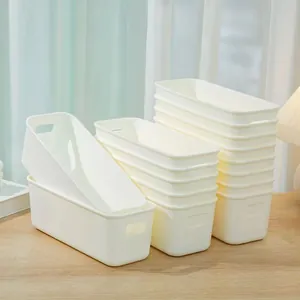 Creamy white rectangular storage box with handles for drawer organization and stackable use