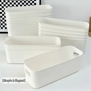 Minimalist white rectangular plastic storage boxes with handles stacked for home organization