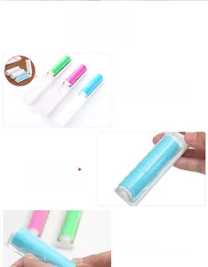 Close-up of portable foldable lint roller in pink, green, and blue for pet hair removal