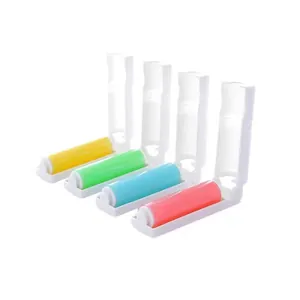 Set of four portable foldable lint rollers in yellow, green, blue, and pink for pet hair