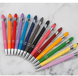 Set of 14 colorful stylus pens with matte finish on white marble background