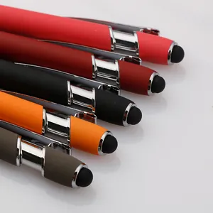 Five assorted matte aluminum ballpoint pens with rubber stylus tips on white background