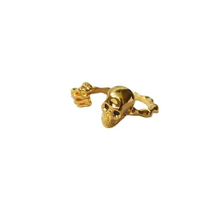Punk style skull and bone hand open ring with polished 18K gold plated copper finish