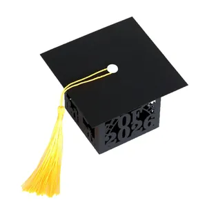 Black graduation cap candy box with 2026 hollow design and yellow tassel detail