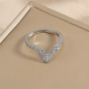 Elegant silver V-shaped snake ring with sparkling pavé zircons and adjustable open band