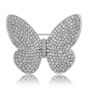 Exquisite butterfly brooch with shimmering rhinestones on silver metal for suits