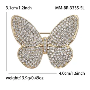 Sparkling butterfly rhinestone brooch in gold finish measuring 3.1cm by 4.0cm
