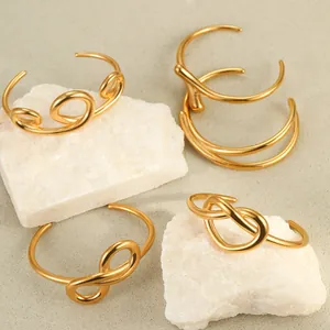 Minimalist 18K gold plated stainless steel knot bracelets in various geometric designs