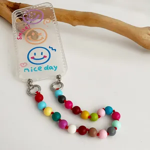 Colorful beaded phone strap with graffiti smile pattern on transparent phone case