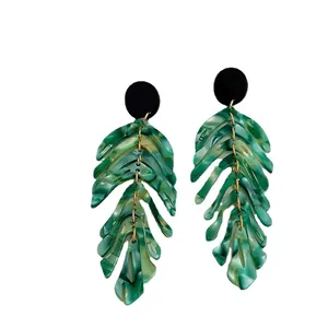 Exaggerated retro green acrylic leaf drop earrings with long tiered fringe and gold rings