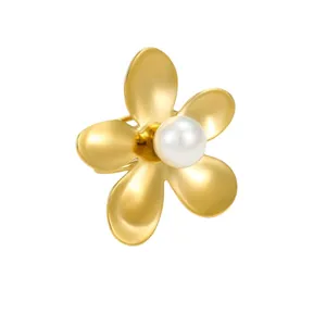 Elegant gold flower ring with pearl center featuring a minimalist petal design