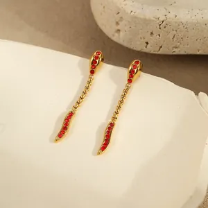 Elegant gold-plated snake snake drop earrings with sparkling red cubic zirconia stones