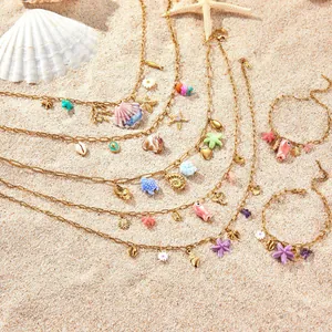 Collana in Acciaio Inossidabile Stile Oceano Placcata Oro 18K Ciondolo Stella Marina Conchiglia Perla Artificiale Strass Donna