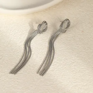 Elegant long tassel earrings with stainless steel knot design and snake chain fringe