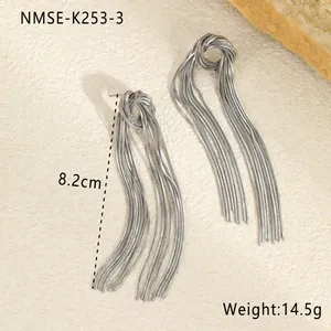 Detail view of long silver tassel earrings showing 8.2cm length and 14.5g weight info