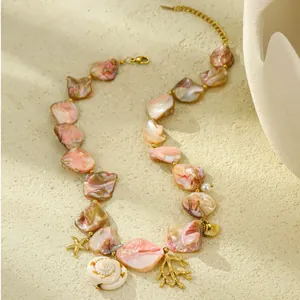 Pink shell and coral ocean-themed stainless steel necklace with starfish pendant for women