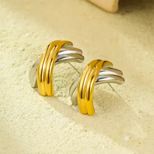 Minimalist X-shape crossover earrings in two-tone gold and silver textured stainless steel