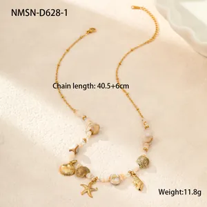 Detail of gold ocean necklace with natural seashells, starfish charms and size specs