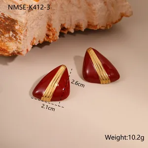 Detailed view of burgundy enamel triangle earrings with gold stripes and dimensions