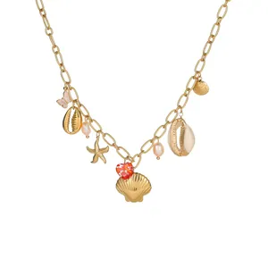 Gold stainless steel ocean necklace with starfish shell charms and freshwater pearls