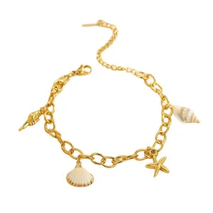 Gold ocean style stainless steel necklace featuring shell, conch, and starfish charms