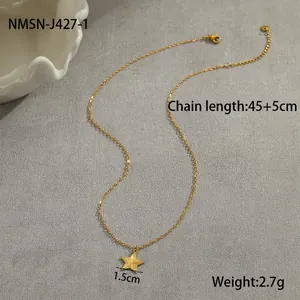 Detail of gold star pendant necklace with 45+5cm chain length and 1.5cm width measurements