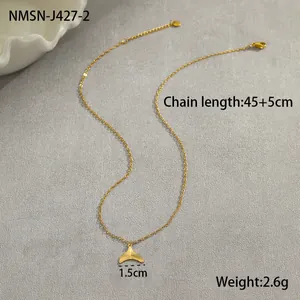 Detailed close-up of a gold whale tail pendant with 45+5cm stainless steel chain