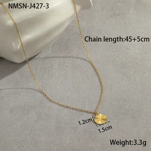 Detailed view of golden sunburst pendant with 45+5cm adjustable stainless steel chain