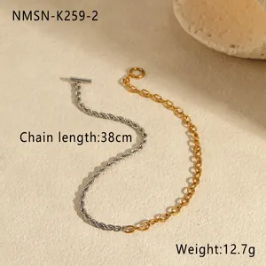 Detalle de cadena bicolor plata y oro con cierre de palanca, longitud de 38 cm