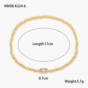 Détail du bracelet perlé en or 18K montrant la longueur 17cm et le poids 5,7g