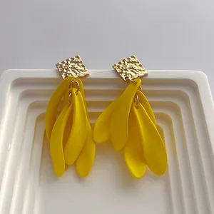 Bohemian retro matte yellow resin petal drop earrings with gold square hammered metal studs