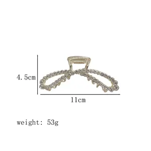 Detail view of 11cm gold hair claw clip with zircon rhinestones and size dimensions